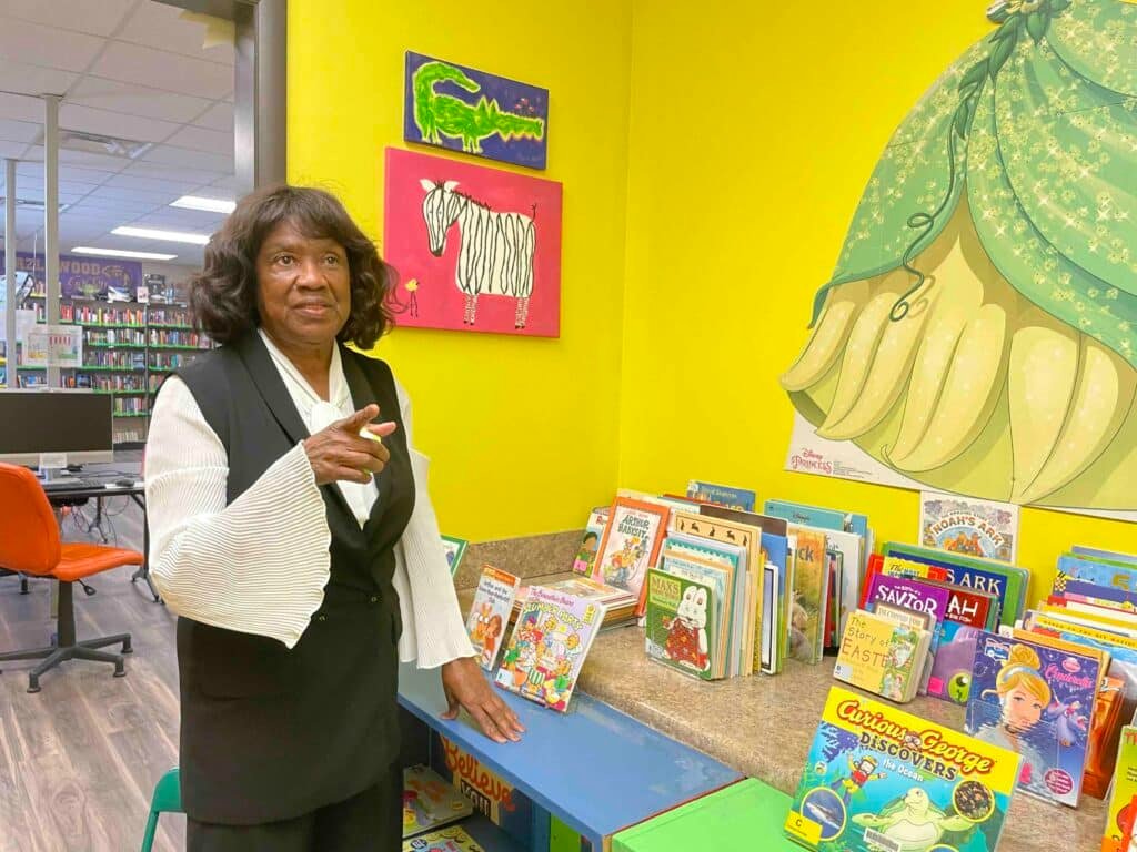 Jewel Crutch-Satchel with children's books at the Town Creek Public Library